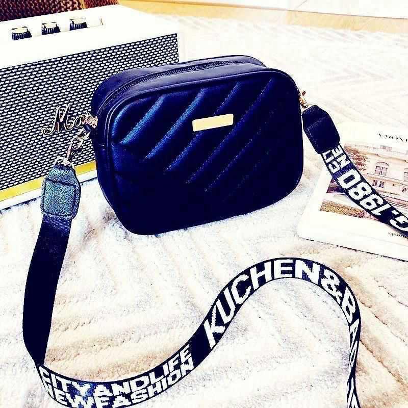 Stylish Black Quilted Crossbody Bag with Gold Accents
