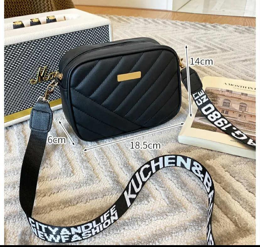 Stylish Black Quilted Crossbody Bag with Gold Accents