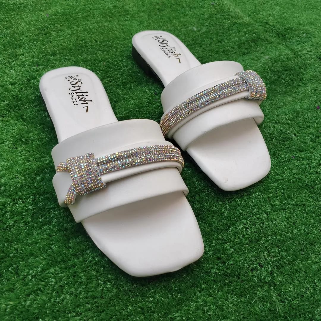 Dazzling White Rhinestone Rexine Flip Flops For Women - Fancy & Versatile Footwear